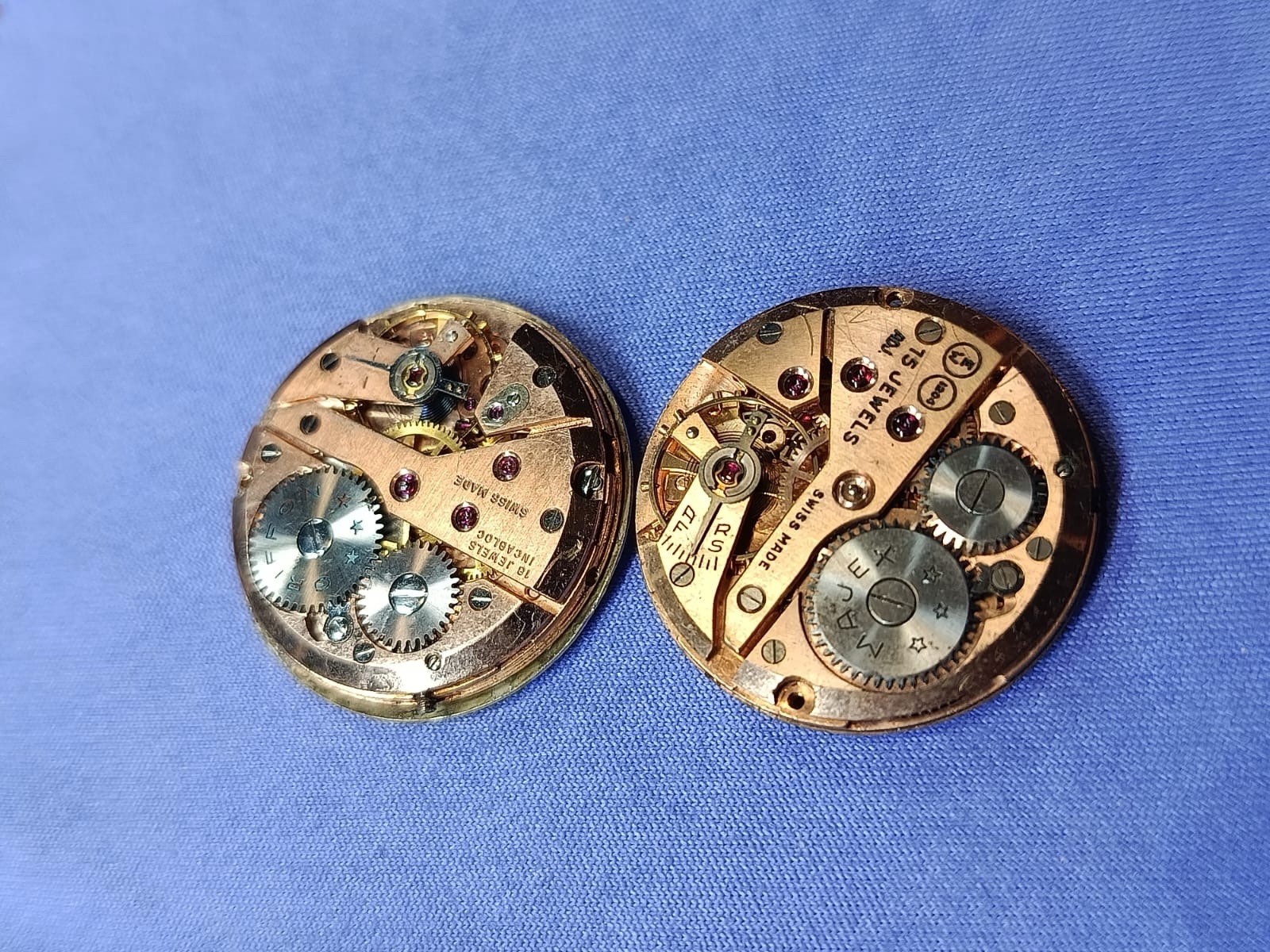 As1203 watch movements Job lot of 2. Approx. 26.7mm both.ticking Swiss