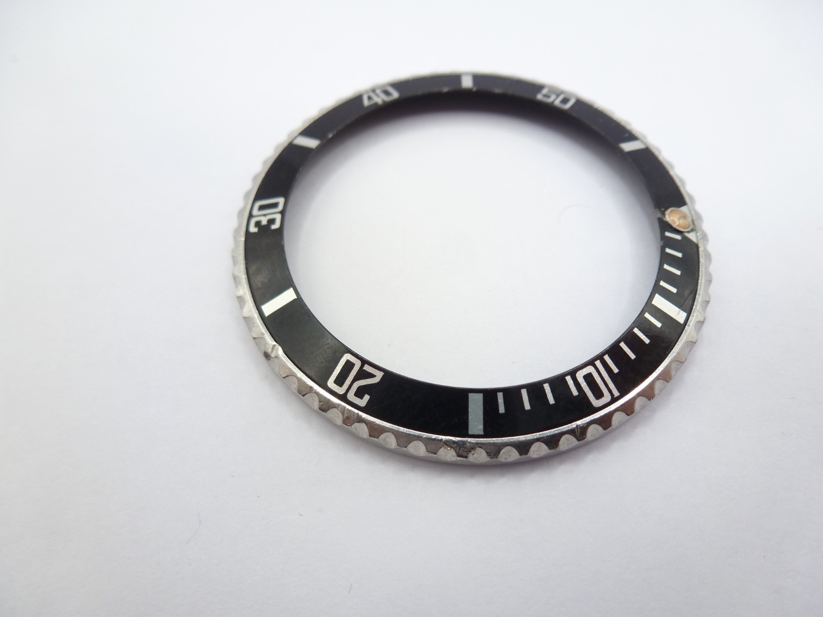 Genuine Rolex Submariner 16610/16800 complete bezel with insert vintage used .