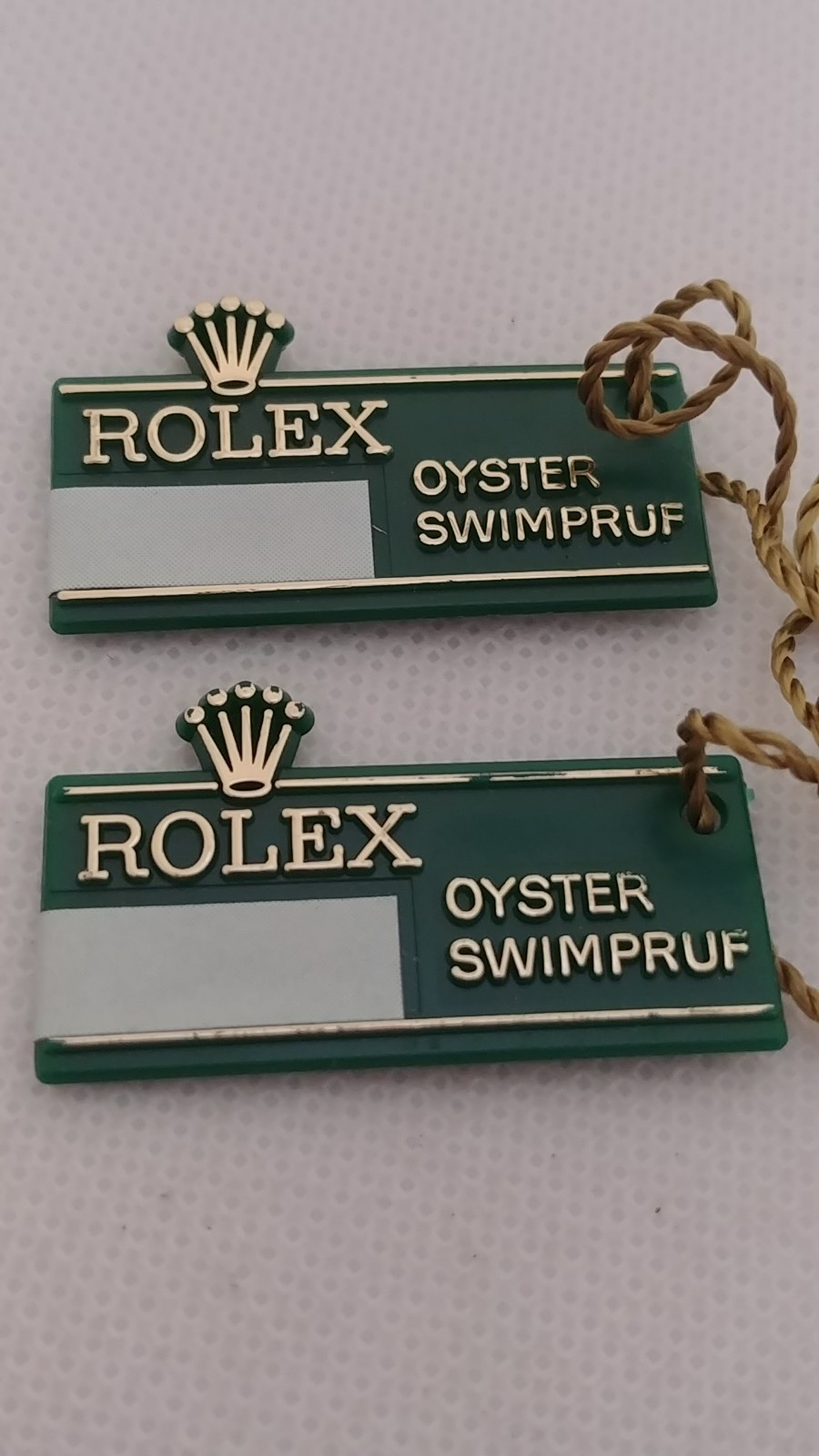 1 Piece Vintage Rolex Oyster Swimpruf Big Crown Green Hang Tag. The item is auth