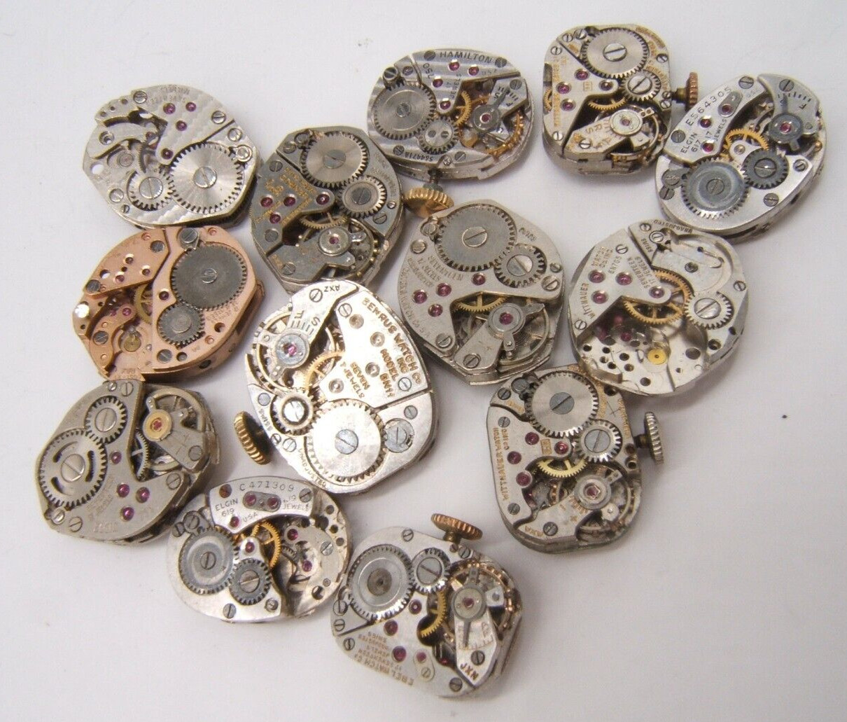 13 SMALL WOMEN’S WATCH MOVEMENTS PARTS REPAIR MECHANICAL WIND UP (LOT GH)
