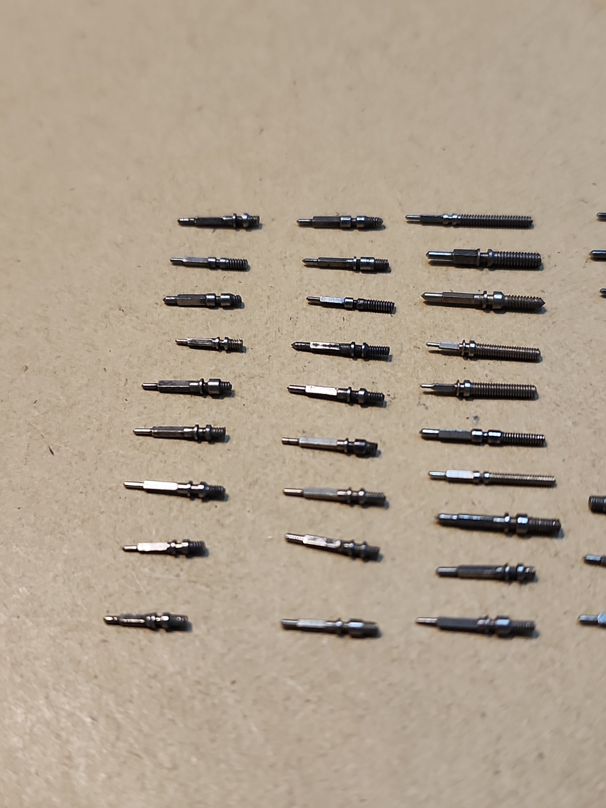 Lot Of 56 Mixed Wristwatch Winding/Setting Stems-Variety Of Types And Tap Sizes