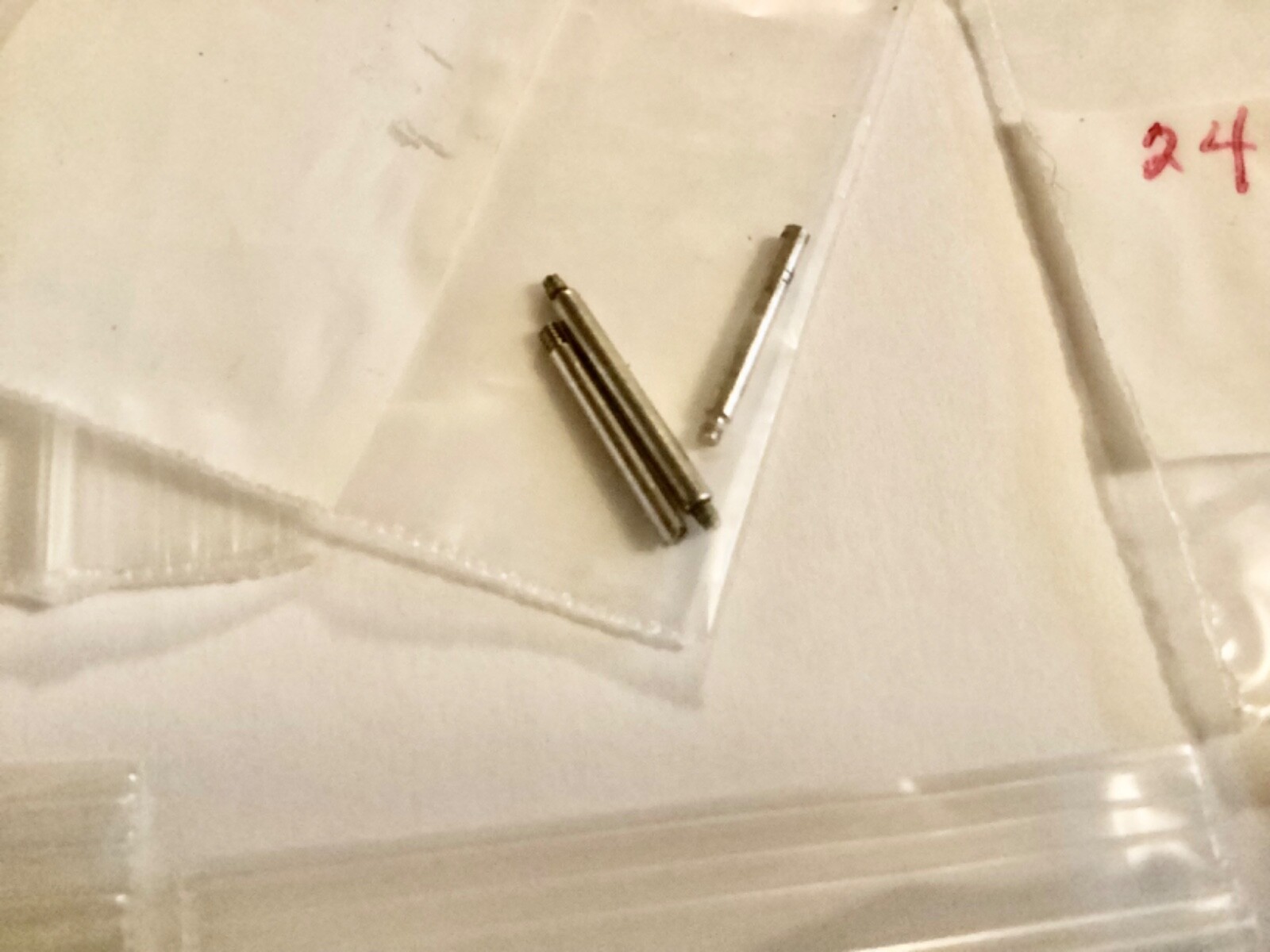 watch band pins unkown parts some with numbers