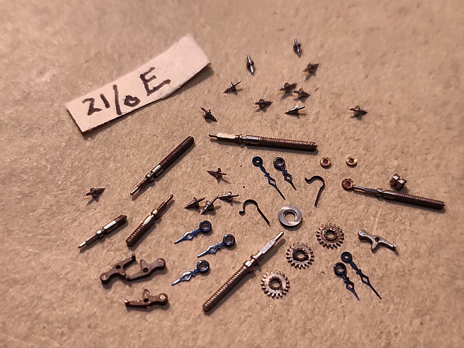 Lot Of NOS Elgin 21/0 Mixed Parts-Stems, Balance Staffs, Jewels, Hands, Etc