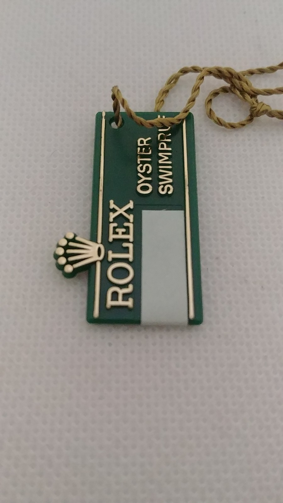 1 Piece Vintage Rolex Oyster Swimpruf Big Crown Green Hang Tag. The item is auth