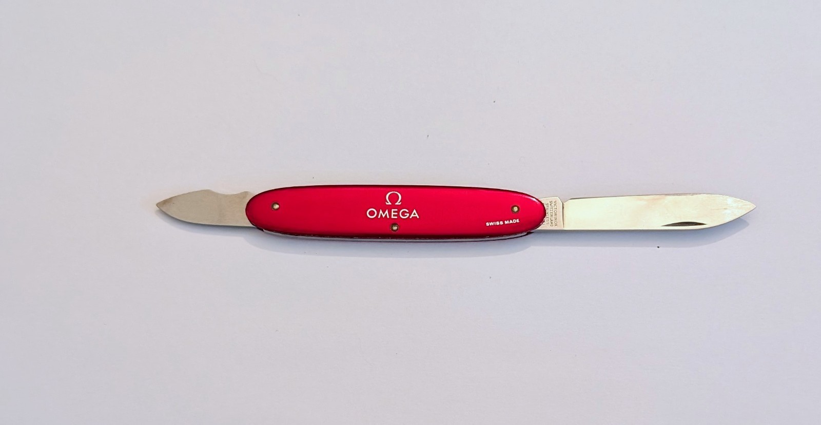 Omega Watch Pocket Knife Swiss Made Norman M Morris Corp New York Victorinox