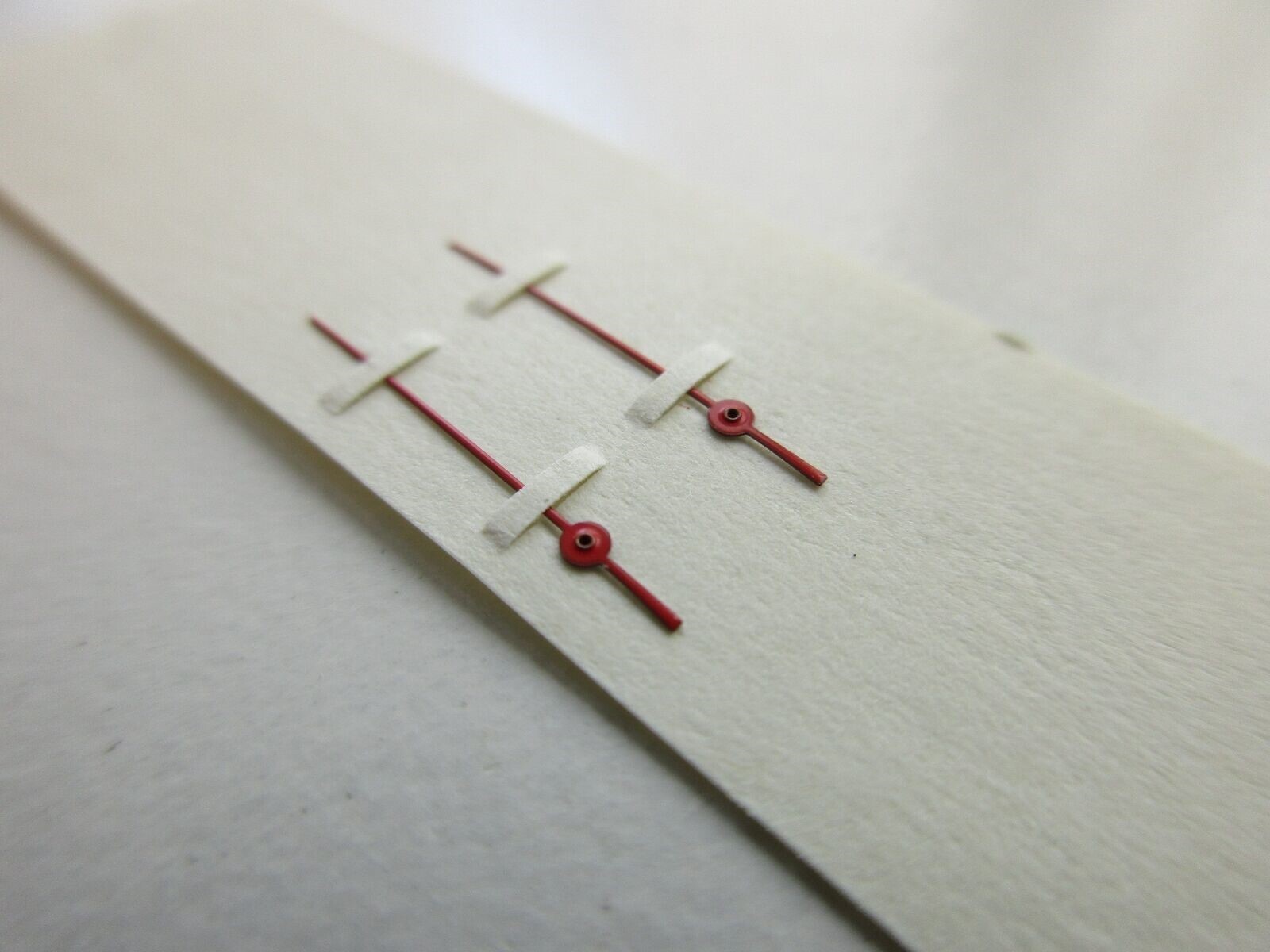 Red seconds watch hand 0.21 – length 11 mm center to tip – 2 pcs