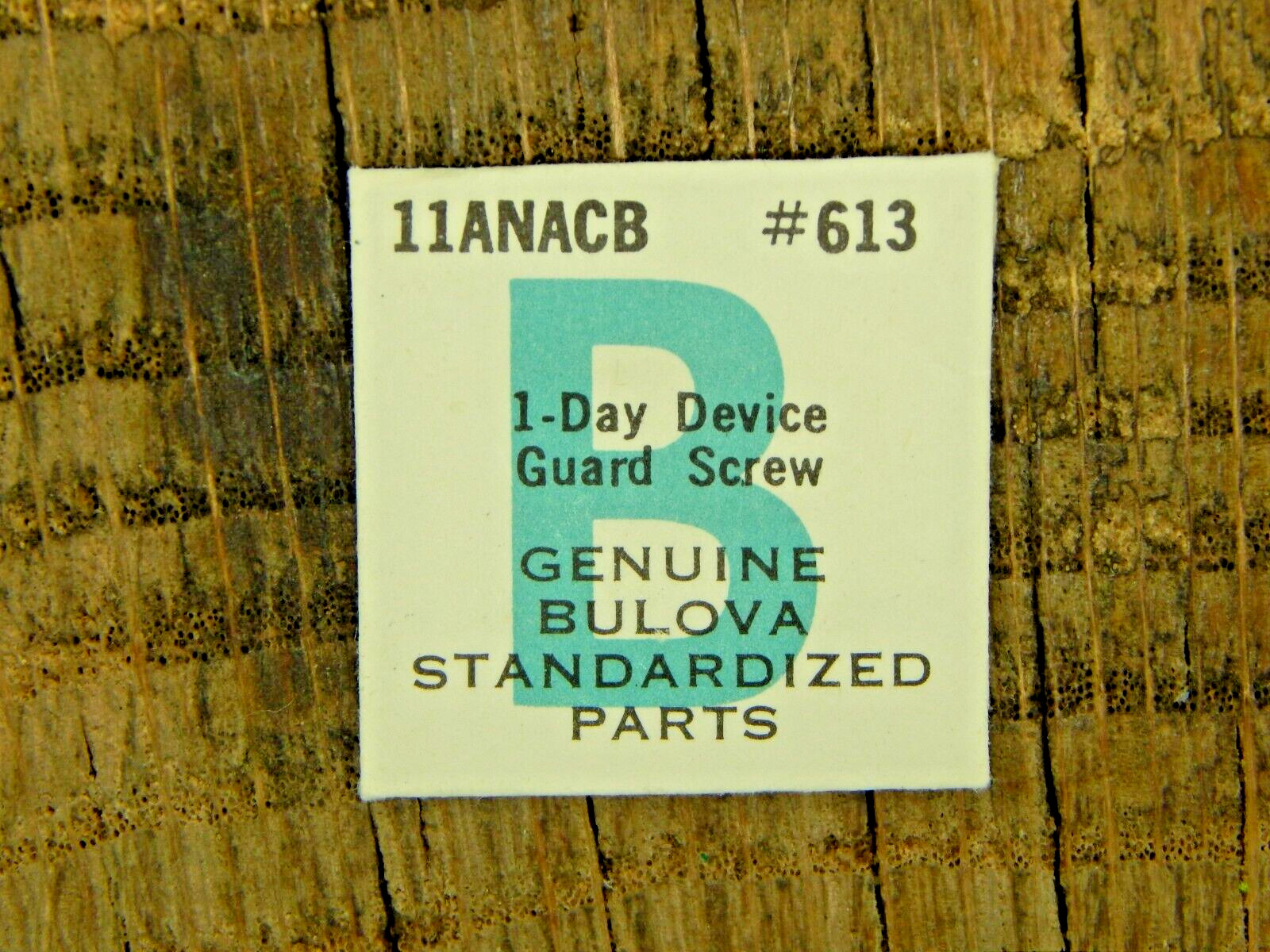 Genuine Bulova 11ANACB Day Device Guard Screw 613 Watch Part NEW OLD STOCK