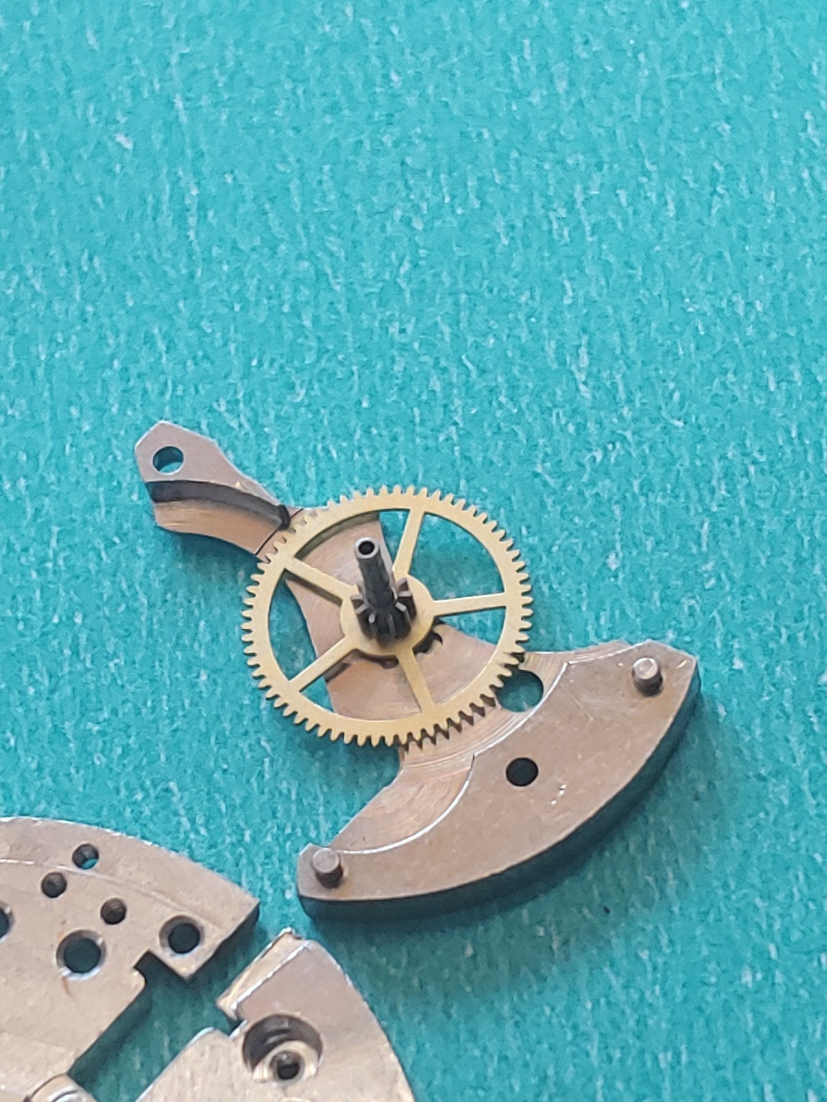AS Cal. #1187/94 Base Plate, Minute Wheel And Bridge. Screws, Inca Jewel & Clip
