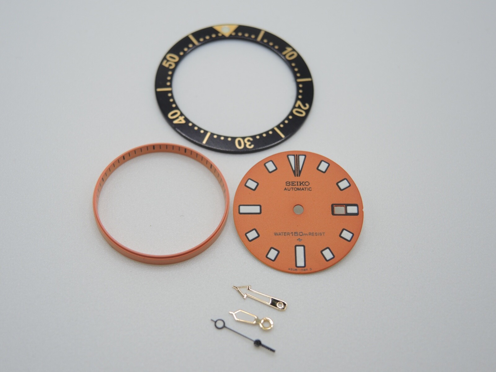 NEW ORANGE DIAL,HANDS,BLACK/GOLD INSERT SMALL DIVERS 4205-014A/014B LADIES WATCH