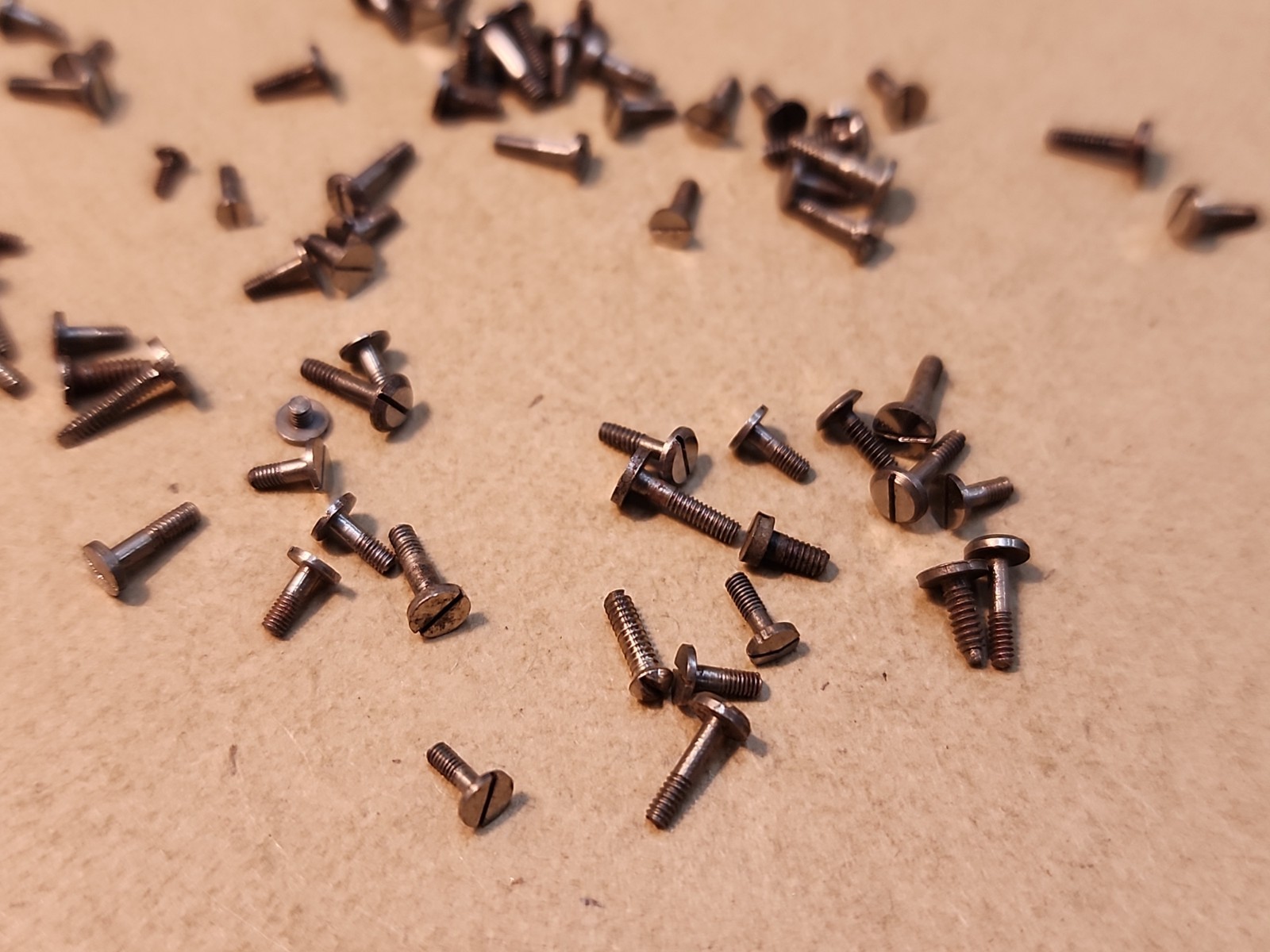 Lot Of 80 Mixed Pocket Watch/Wristwatch Case And Movement Screws Parts Spares