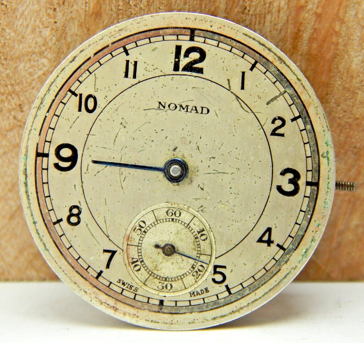 Vintage Nomad 15 jewel men’s 8/0s wrist watch movement with dial hands and stem