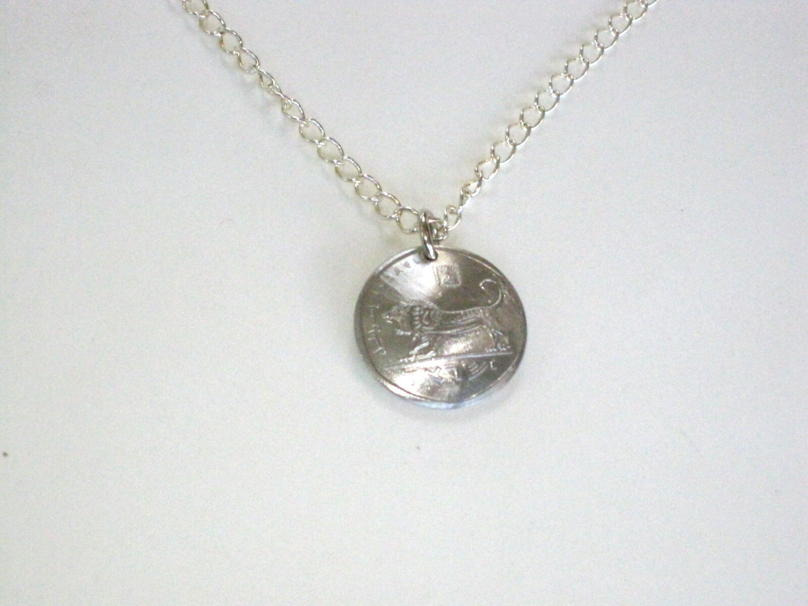 Israeli fierce lion coin necklace-nicely domed with a free 18″ chain