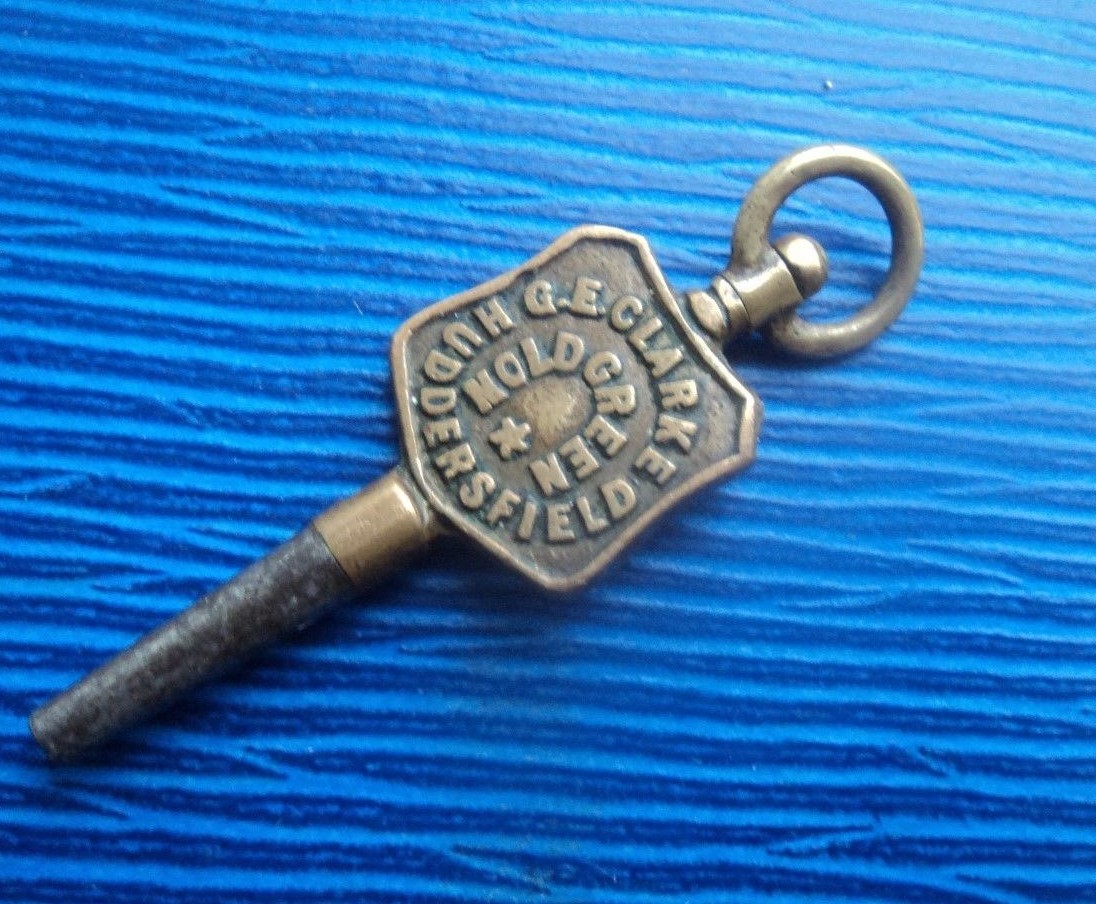 Advertising Pocket Watch Key – G.E. Clarke of Moldgreen Huddersfield Yorkshire