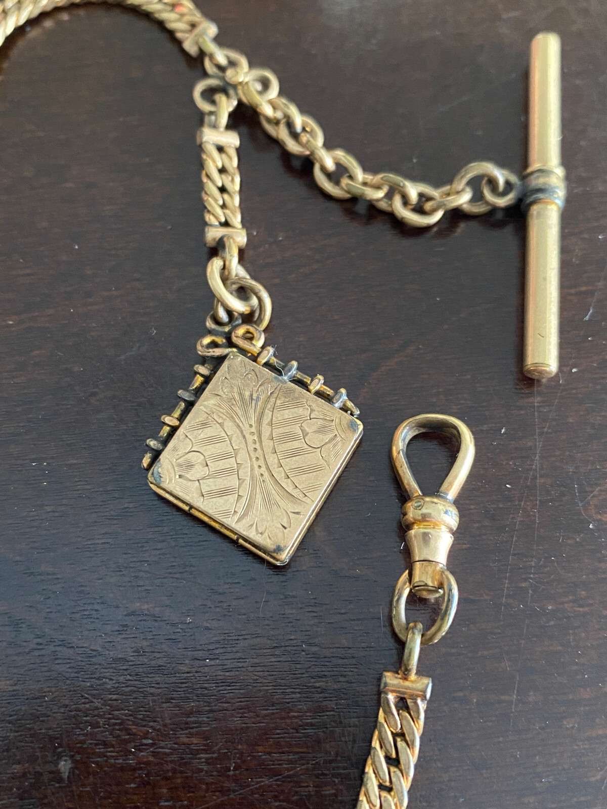 VINTAGE SIMMONS 11 INCH POCKET WATCH CHAIN, YELLOW GOLD FILLED WITH LOCKET FOB