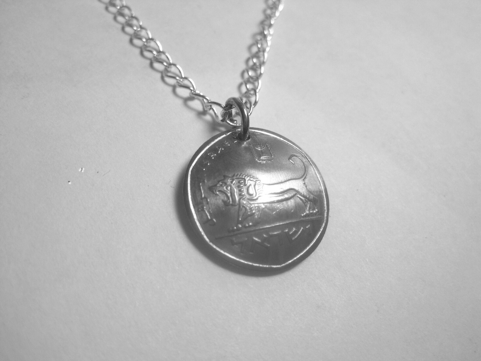 Israeli fierce lion coin necklace-nicely domed with a free 18″ chain