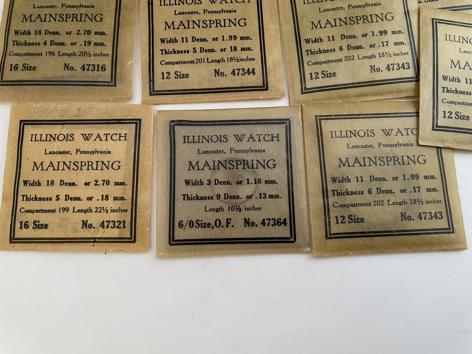 Collection of 11 Illinois Watch Mainsprings of various sizes