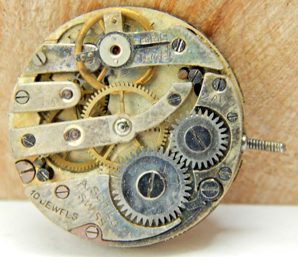 Vintage A, Schild 10 jewel 2 Adjustment 8/0s open face watch movement with dial