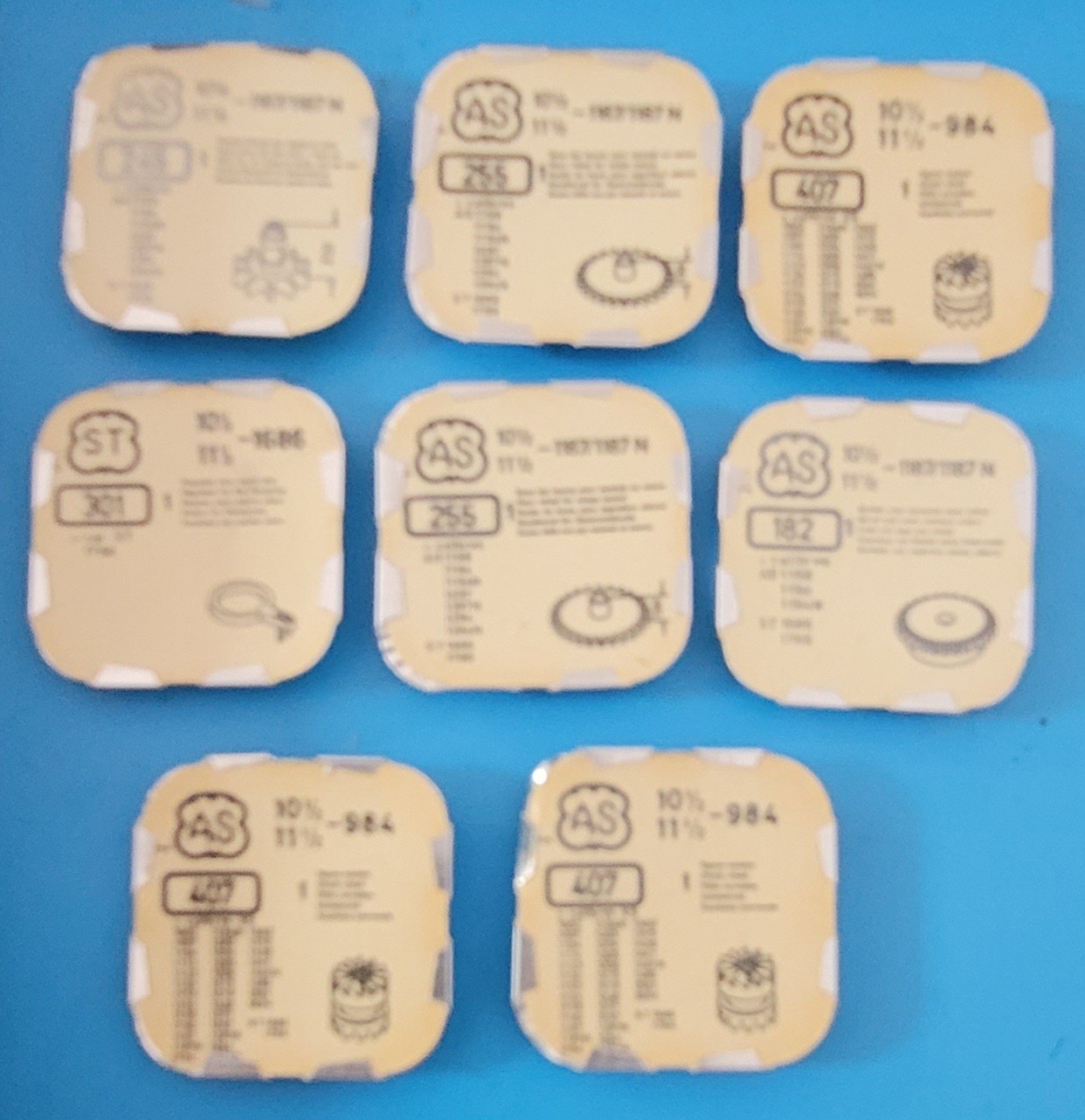 SB2-013: Lot NOS Watch Parts for AS 1686/984/1187 – Levers, Gears, Mainsprings