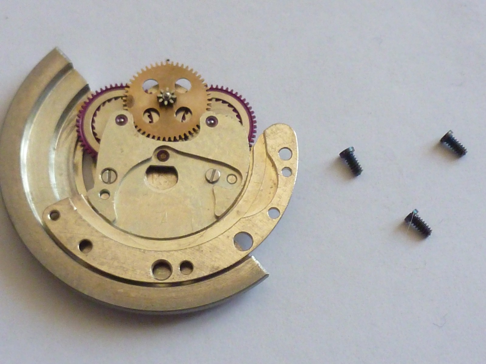 GENUINE Authentic Rolex Rotor + bridge 1560 perfect condition completely screw