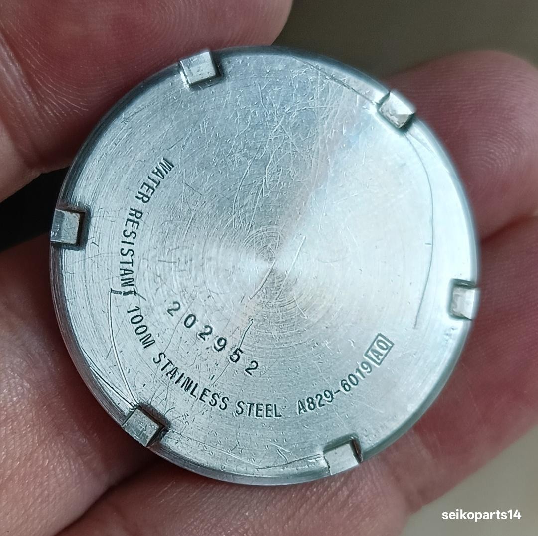 GENUINE SEIKO ASTRONAUT A829-6019 CASE BACK COVER WITH ALARM YEAR 1982 OCTOBER