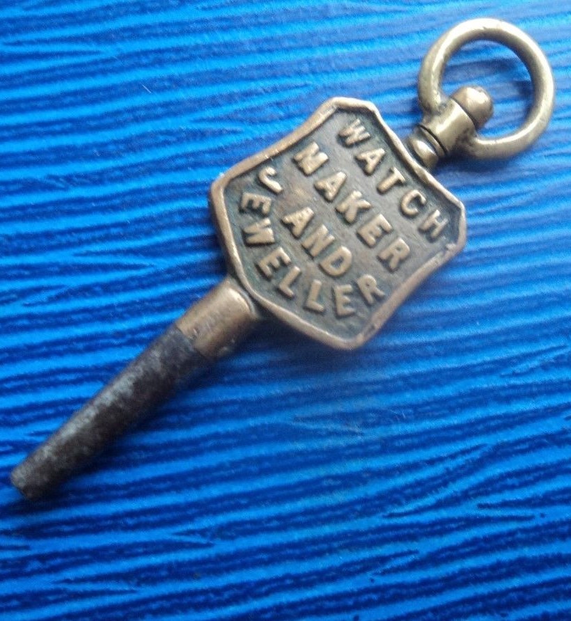 Advertising Pocket Watch Key – G.E. Clarke of Moldgreen Huddersfield Yorkshire