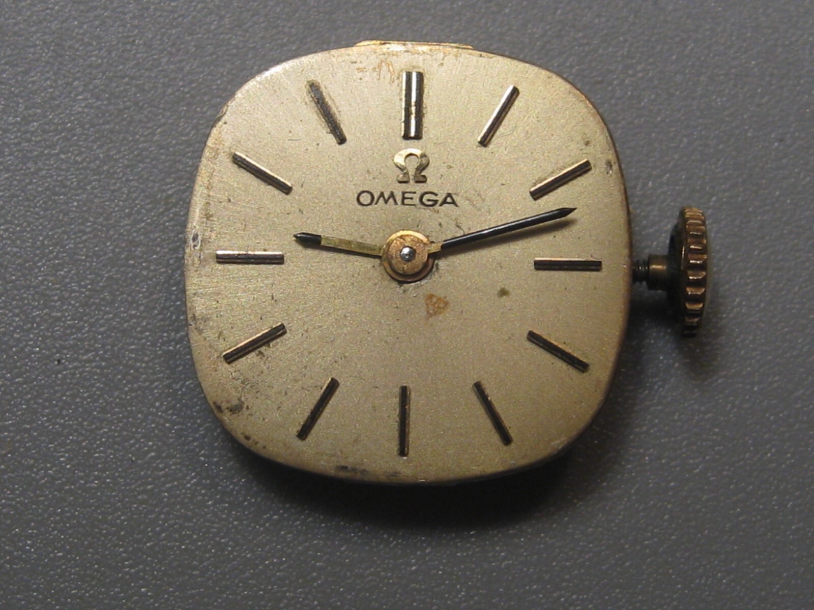 OMEGA Watch Movement. 6 Jewel, Quartz, Swiss Dial, Hands, Crown. Un-tested.