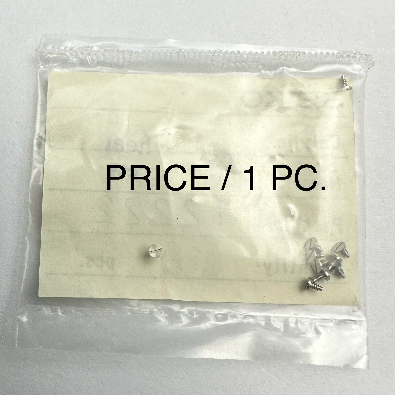 012 222 NOS SCREW FOR BARREL DRIVEN MINUTE PINION BRIDGE SEIKO 60M GOLDFEATHER