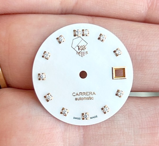 A Tag Heuer Carrera Automatic Wriswatch Dial With Diamond Hour Markers.