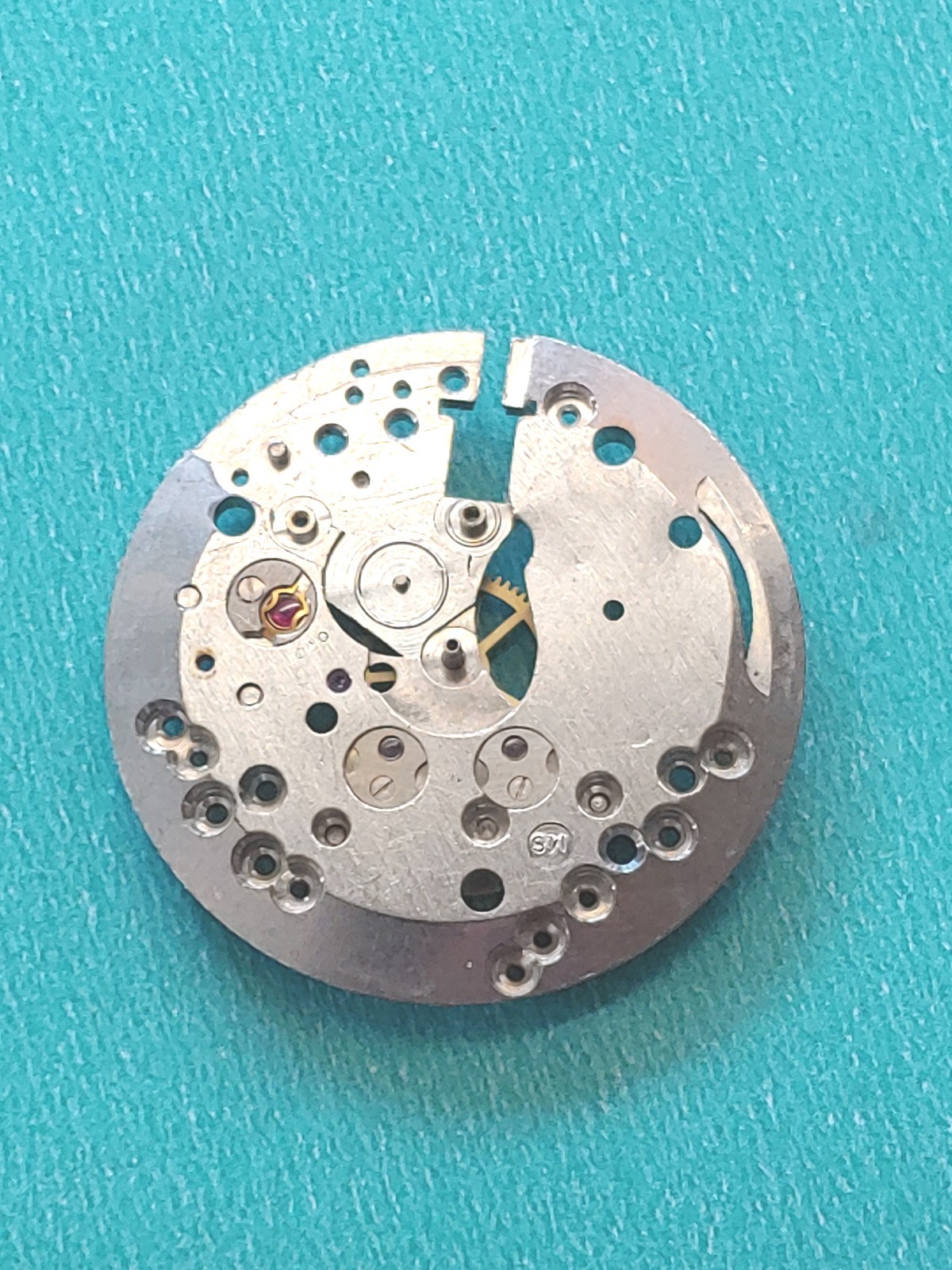 AS Cal. #1187/94 Base Plate, Minute Wheel And Bridge. Screws, Inca Jewel & Clip