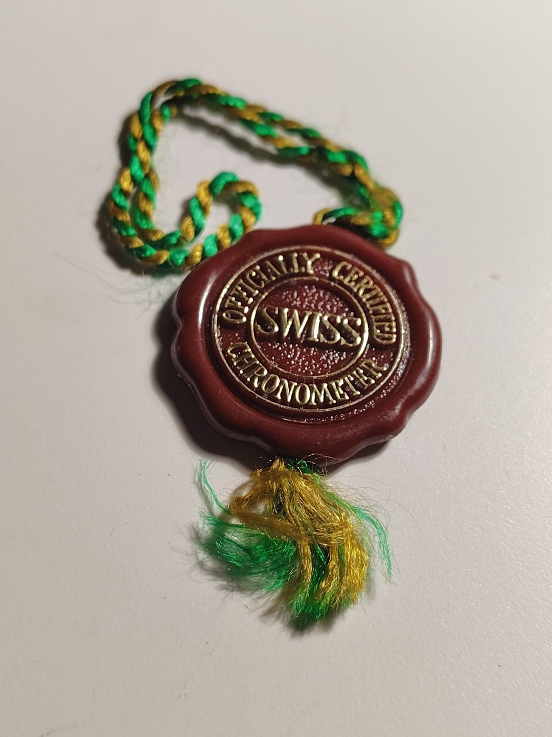 ROLEX Burgundy Hologram Hang Tag Swiss Officially Certified Chronometer