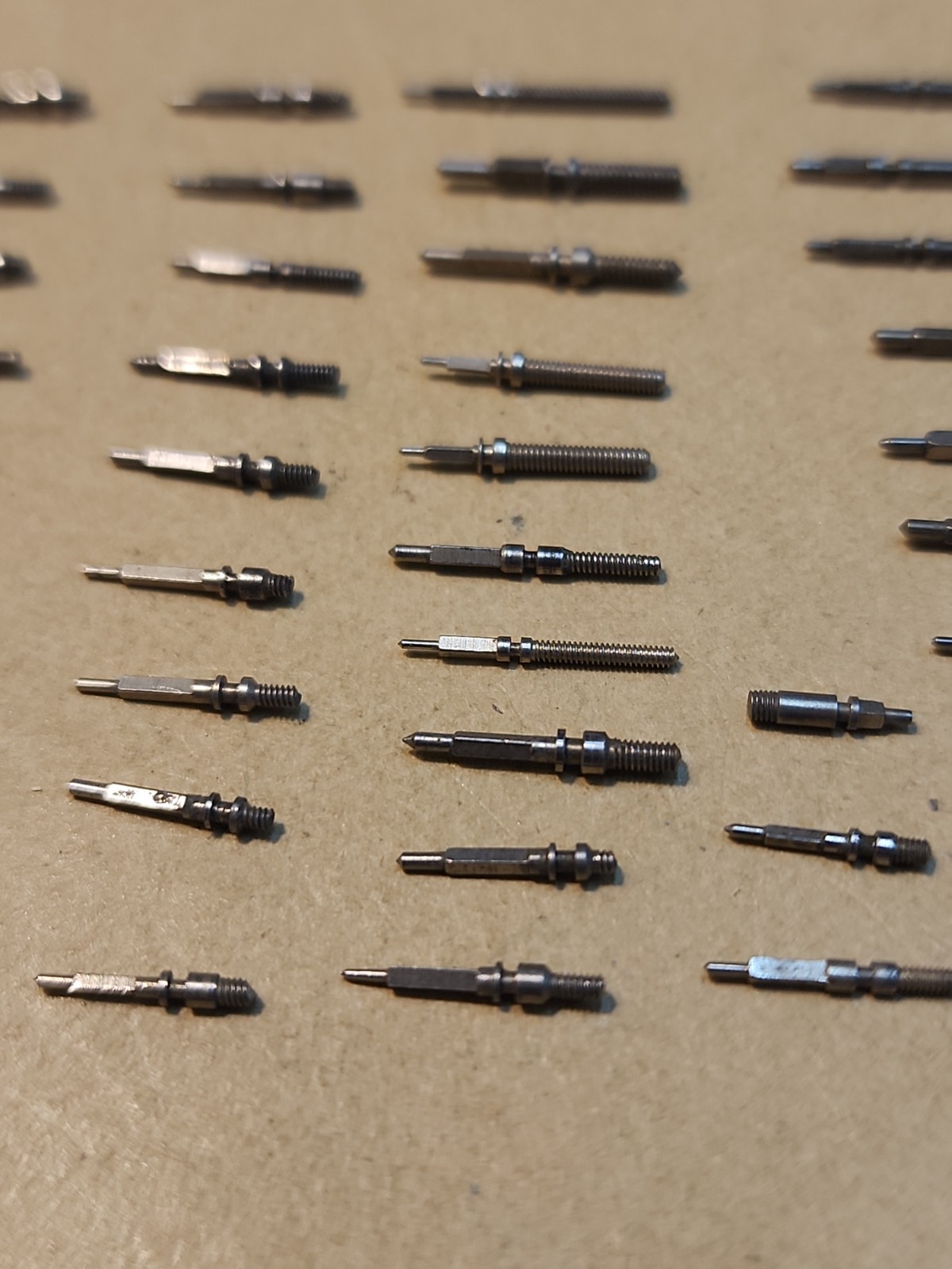 Lot Of 56 Mixed Wristwatch Winding/Setting Stems-Variety Of Types And Tap Sizes