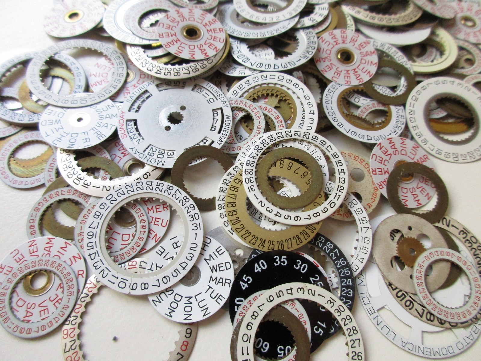 Lot of used 200+ Day and Date disks watch movement parts