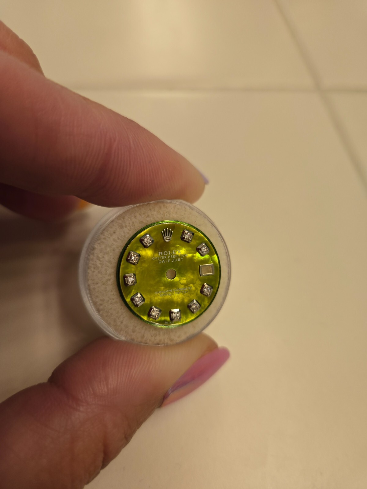 Rolex: green mother of pearl 26mm ladies datejust dial with ten diamonds