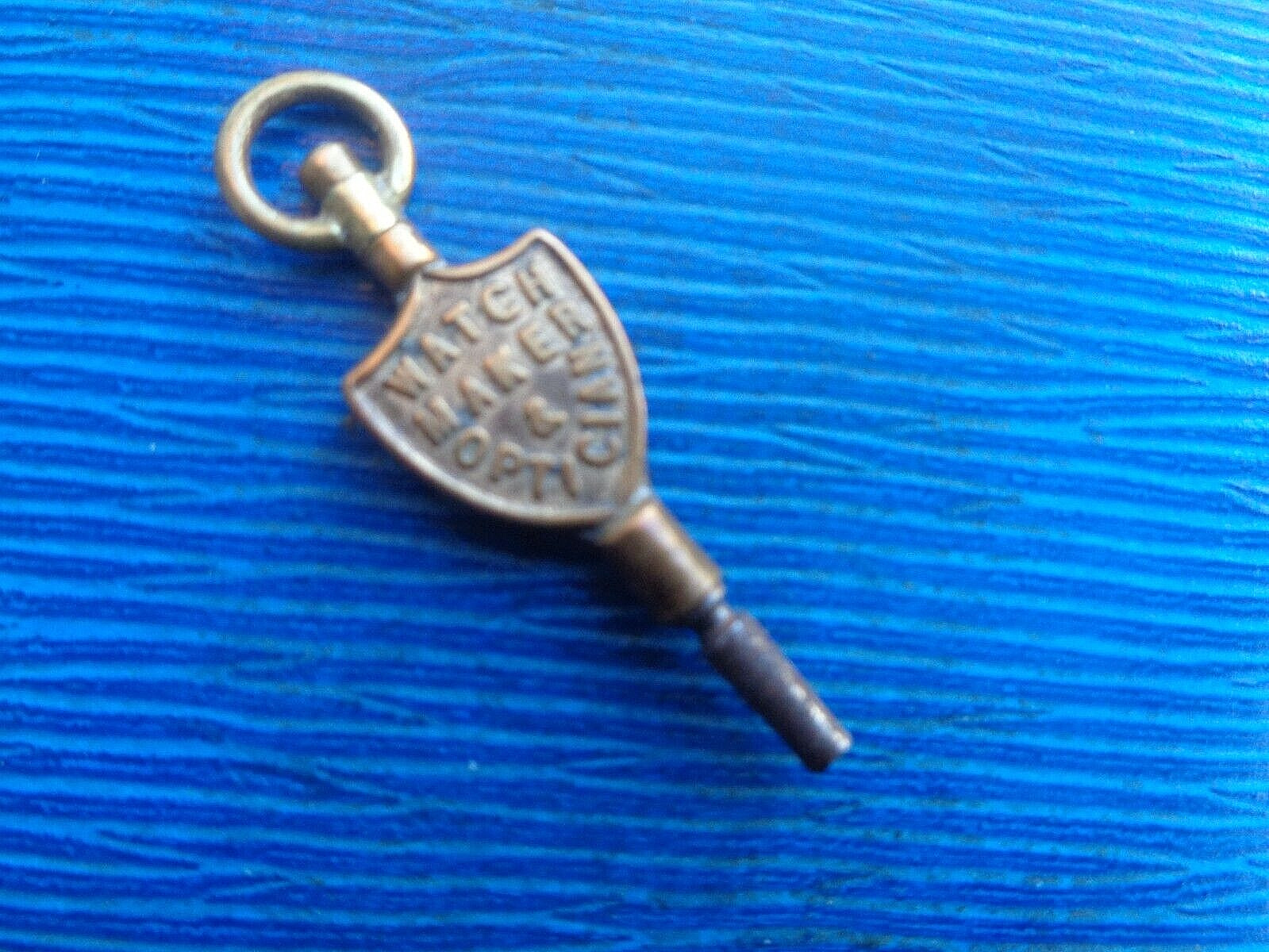 Advertising Pocket Watch Key – J.J. Hill of Bradford Rd. Huddersfield Yorkshire