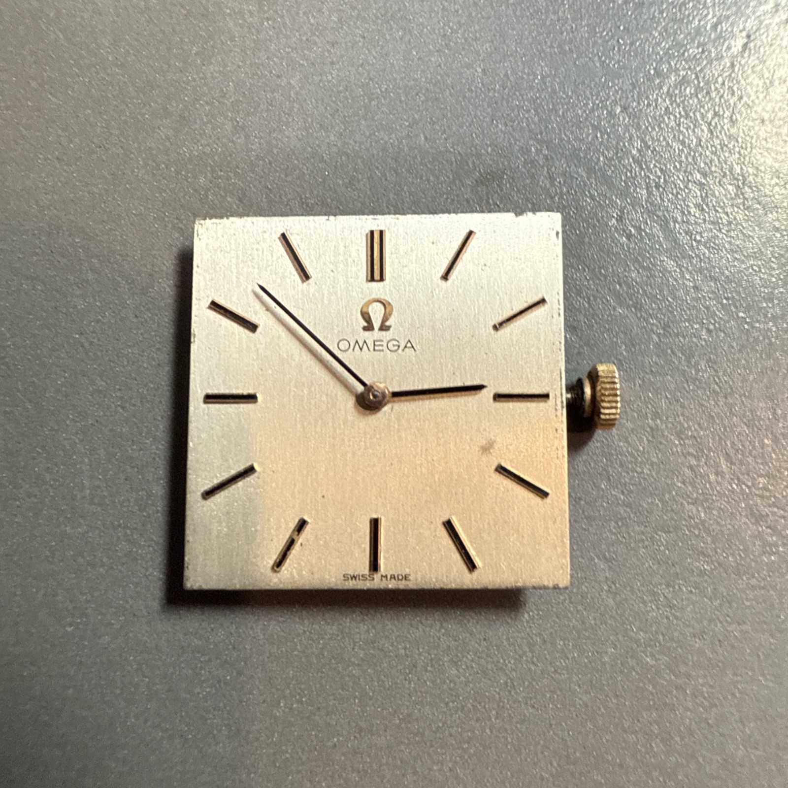 vintage manual-wind Omega square watch dial and movement (Hands Function)