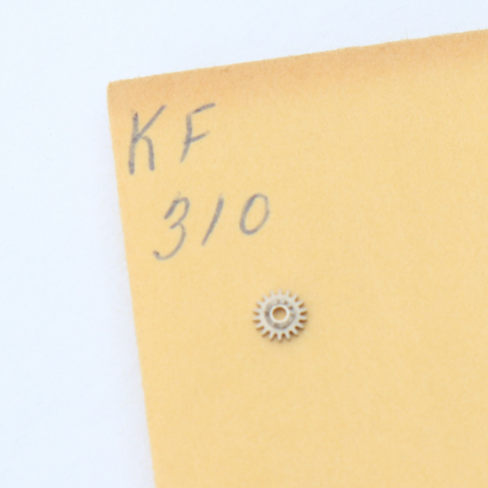 KF 310 Winding Pinion Part 410 New Old Stock Watchmakers Parts (C12D16)