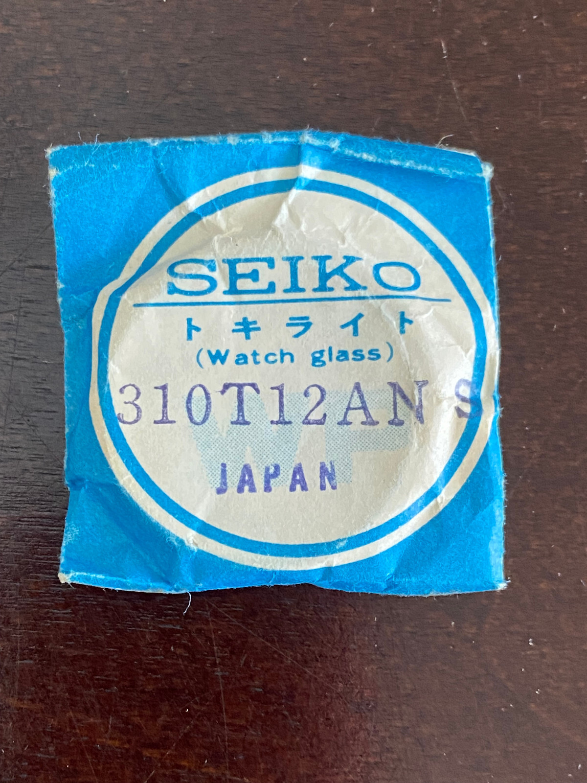 VINTAGE N.O.S. GENUINE SEIKO CRYSTAL , REF # 310T12ANS, ORIGINAL PACKAGE