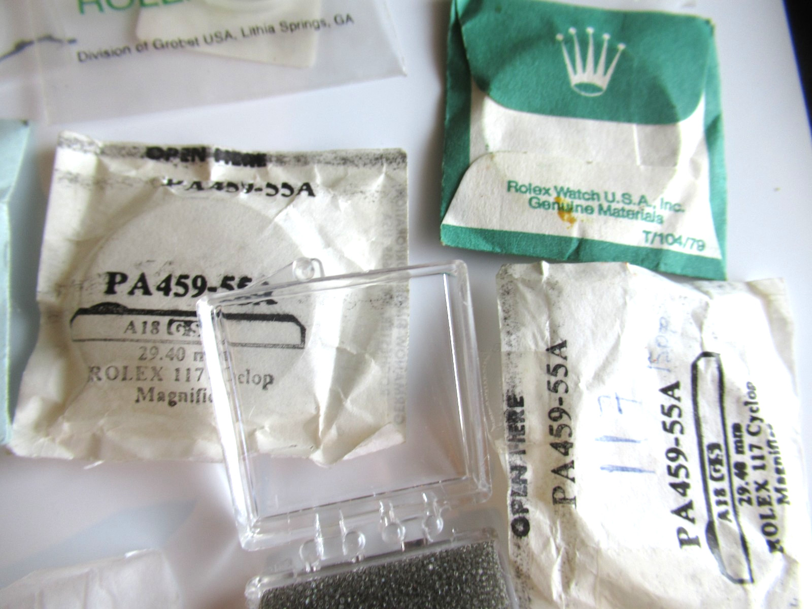 Rolex crystal gaskets hands tin box Various Misc Parts & Brands Lot sold As Is