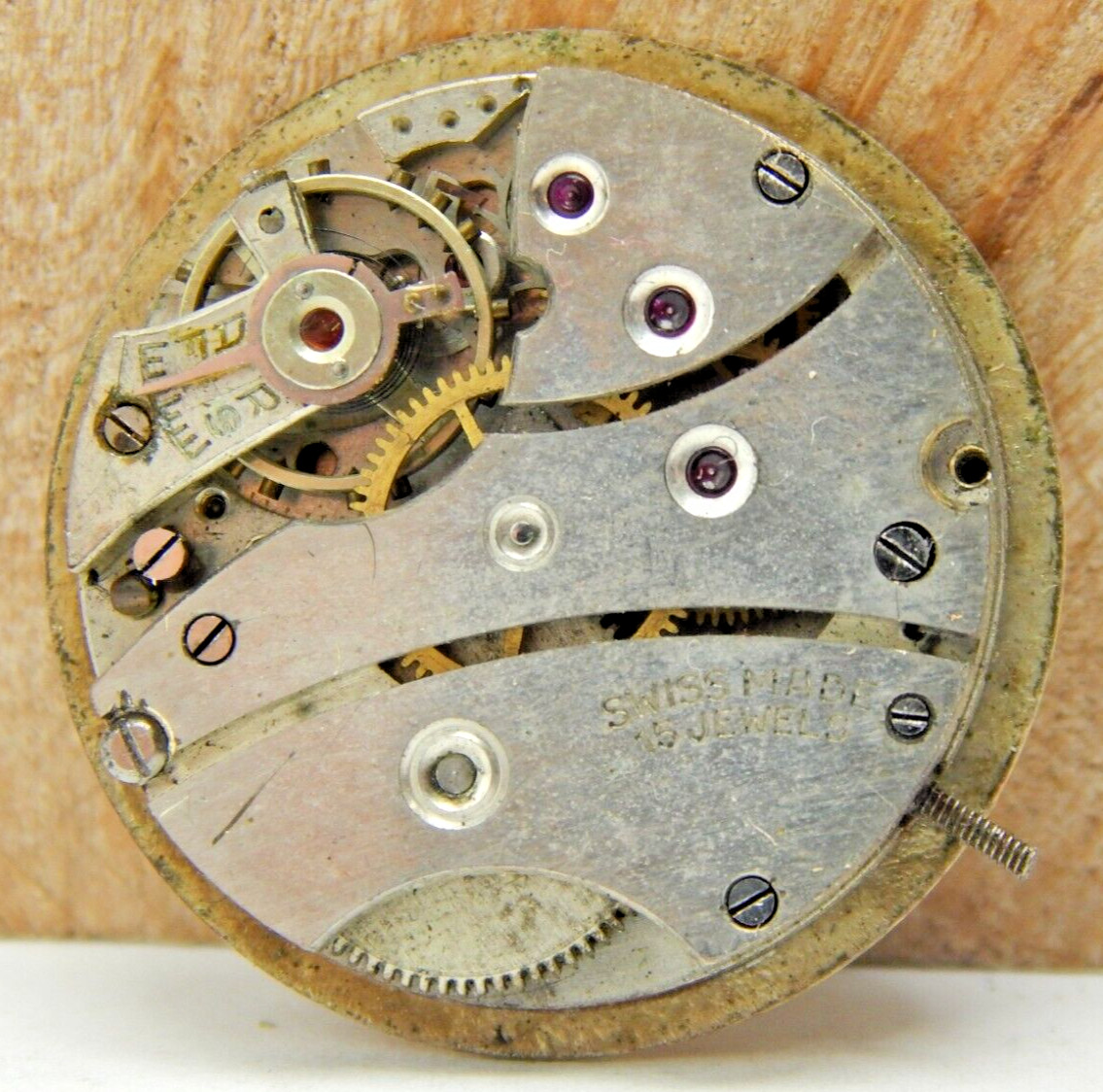 Vintage Nomad 15 jewel men’s 8/0s wrist watch movement with dial hands and stem
