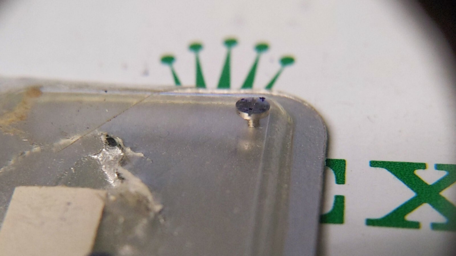 Genuine Rolex 1055 7999 screw for watch repair