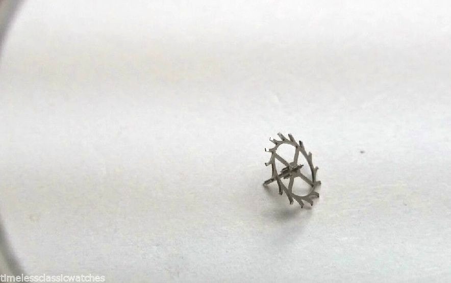 Universal watch parts 215 705 Escape Wheel, Great Condition, Genuine Universal