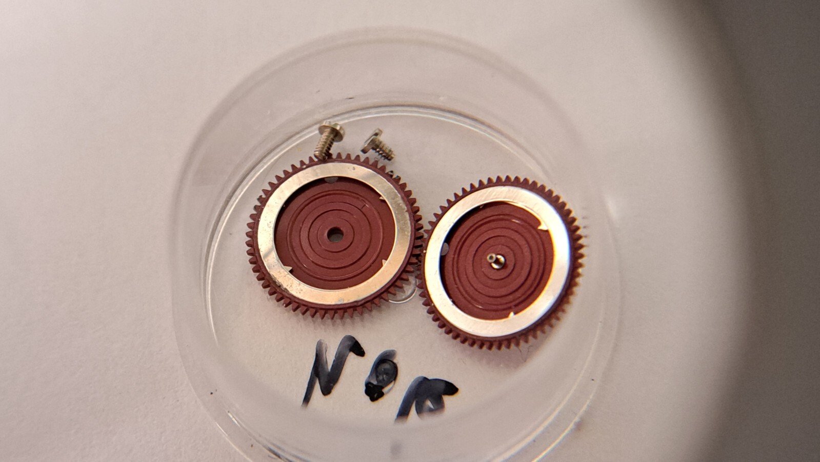 Rolex lot of parts: reversers driving wheel click balance cock bridge pallet for