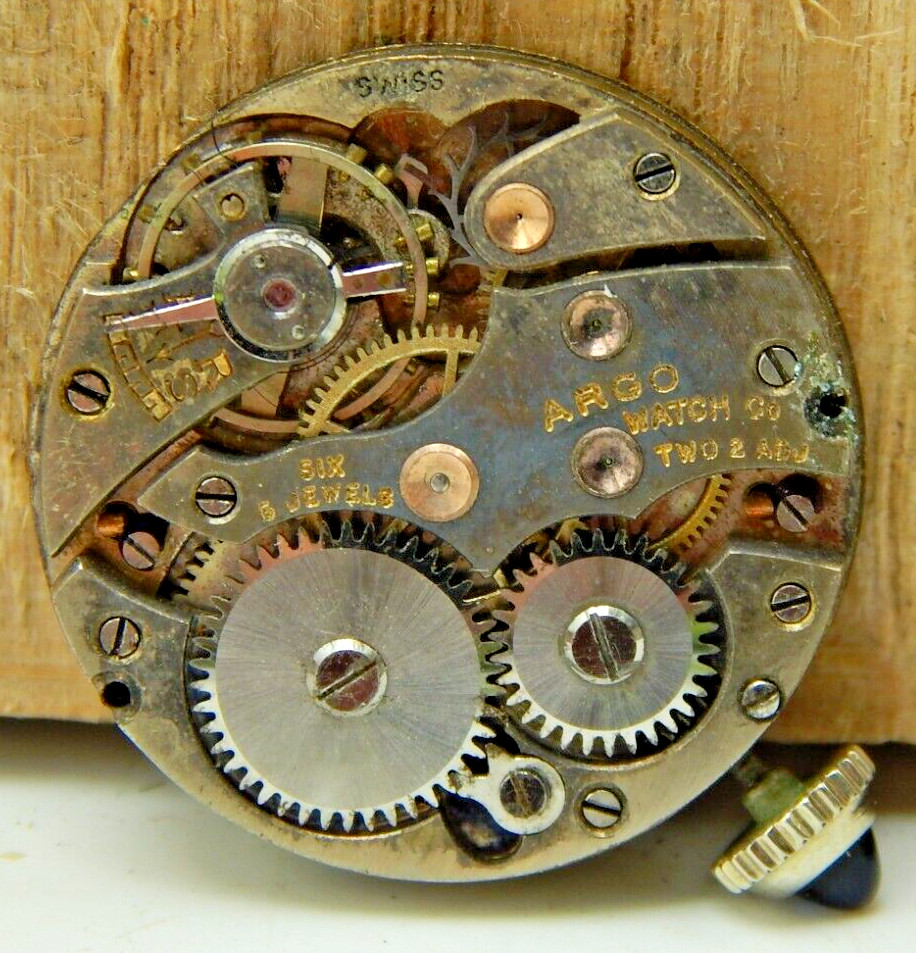 Vintage ARGO 6 jewel 2 adjustment 8/0s watch movement with dial hands and crown