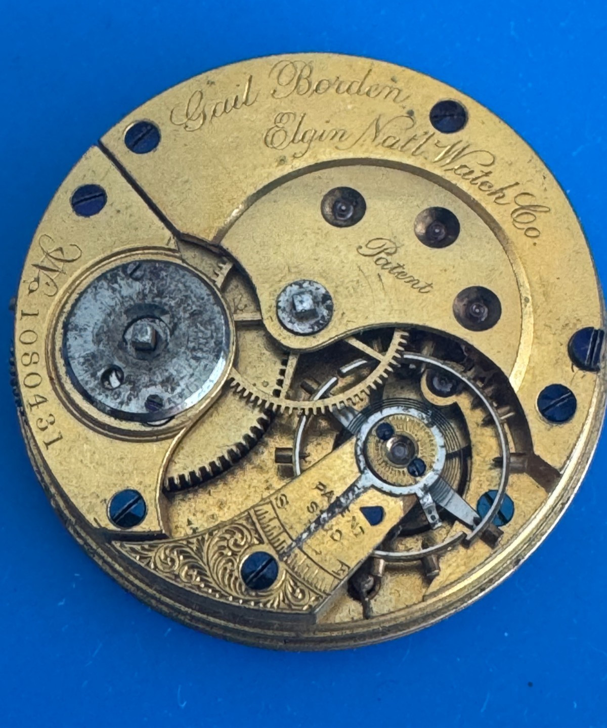 10 SIZE ELGIN GR. 22 GAIL BORDEN POCKET WATCH MOVEMENT NOT RUNNING BAD STAFF