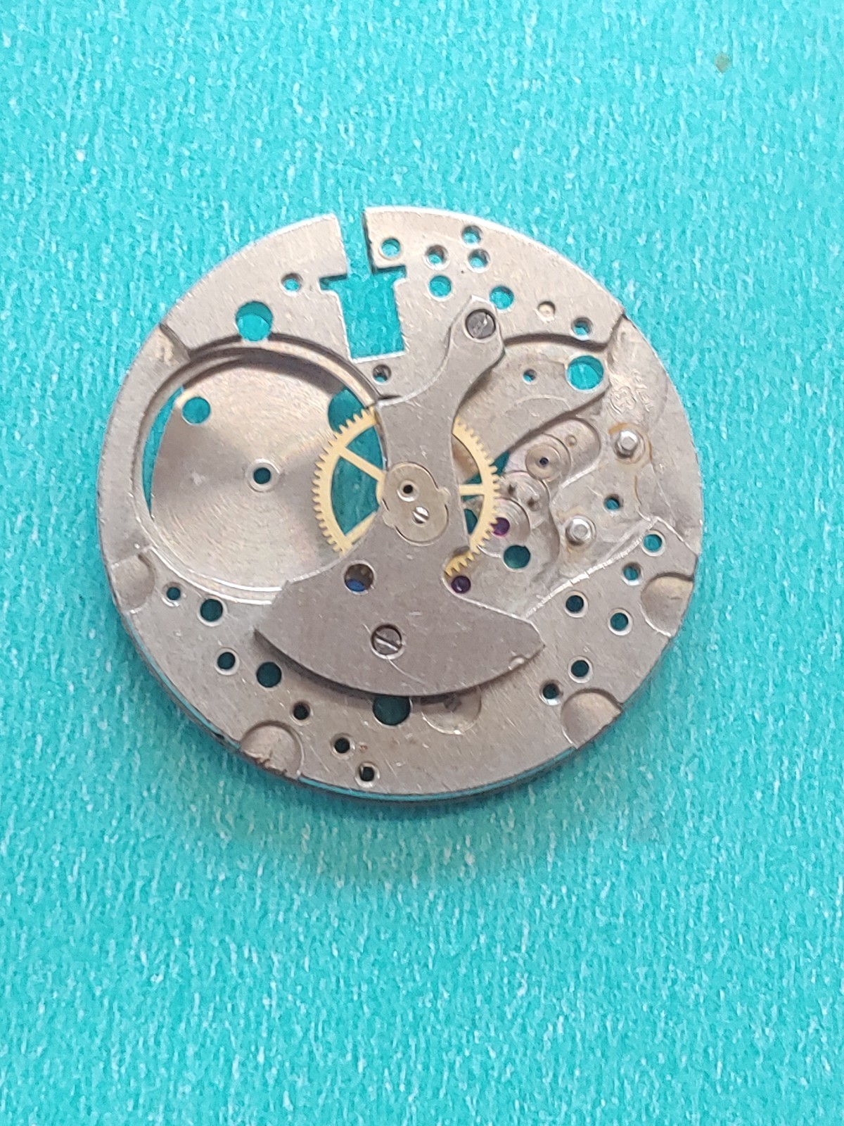 AS Cal. #1187/94 Base Plate, Minute Wheel And Bridge. Screws, Inca Jewel & Clip