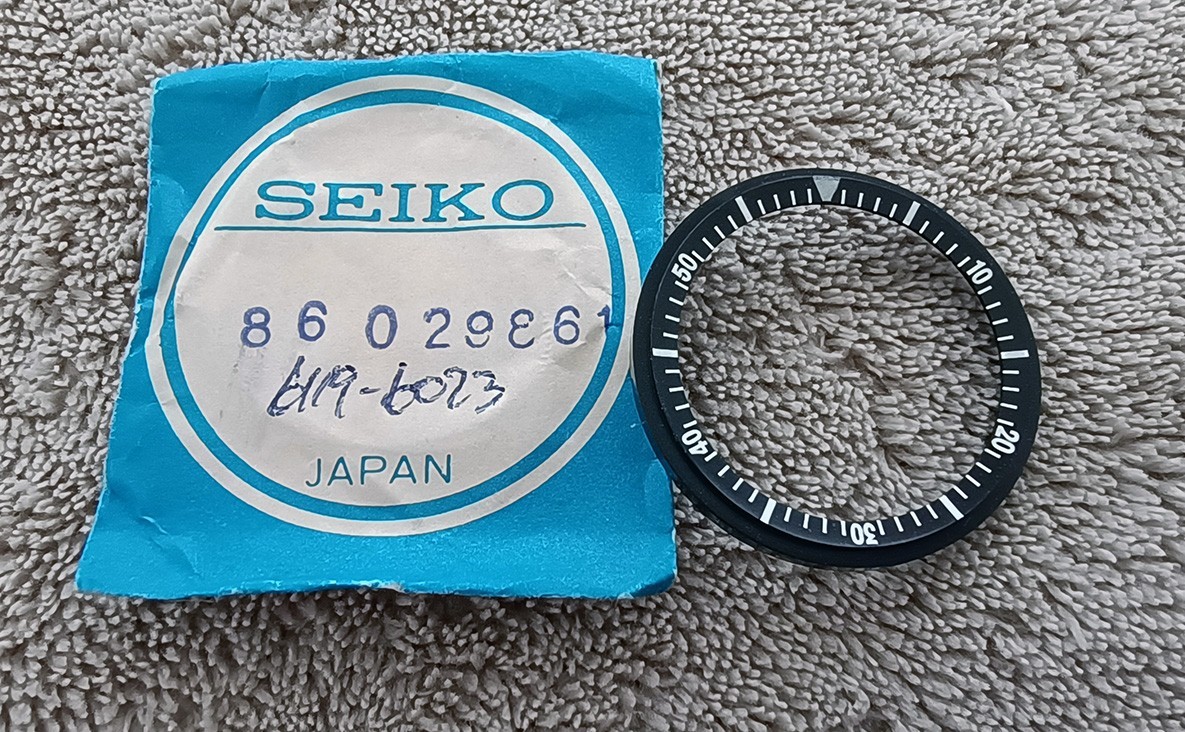NOS GENUINE ROTATING DIAL RING FOR SEIKO 5 SPORTS 6119-6023 PARTS NO. 86029861