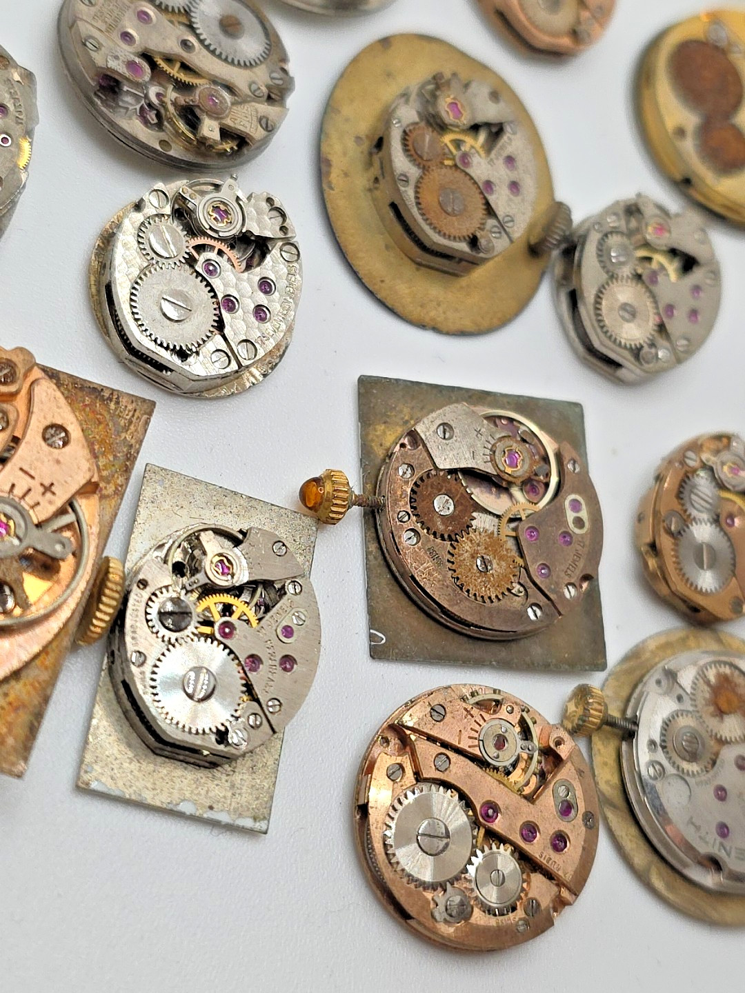 Lot Of 24 Swiss Made Mechanical Movements Complete With Zenith, Revue Dials Etc.