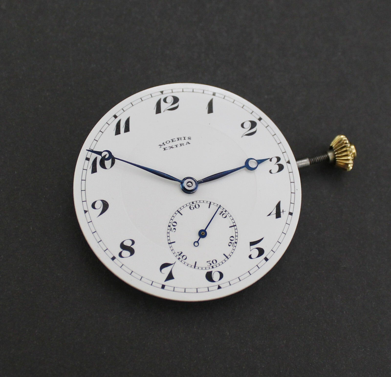 Antique Moeris manual Movement, dial, hands, winding stem & crown . Running!!