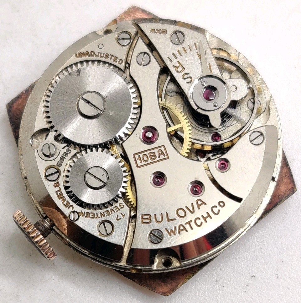 Vintage Bulova Cal. 10BA 17 jewel watch movement Runs For Repair Salmon Dial