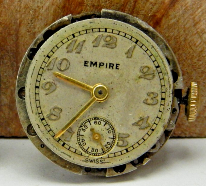 Vintage Empire 7 jewel ladies wrist watch movement with dial hands and case back